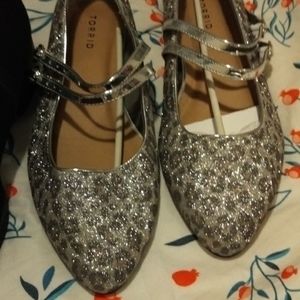 A pair of shoes and a pair of boots